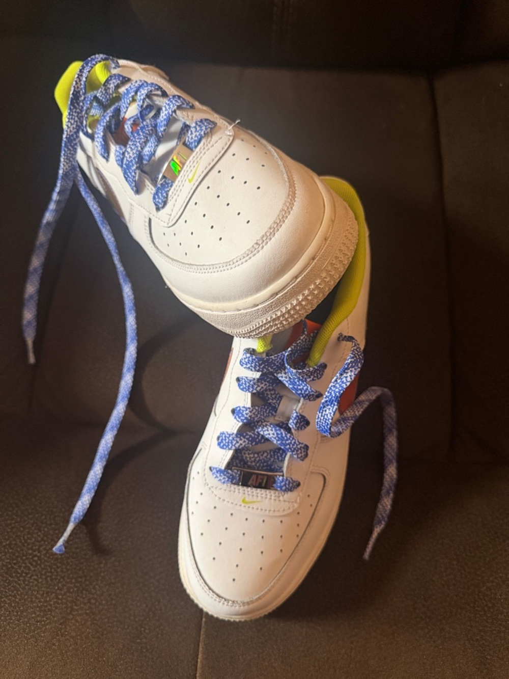 Nike Kids White Sneakers with Blue Laces and Neon Trim